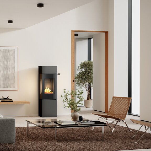 NEXO 140 BIO bioethanol stove in black in the living room