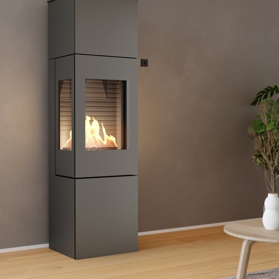 NEXO 160 BIO bioethanol stove in platinum in a cosy living room