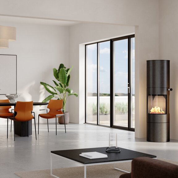 VIVA 160 L BIO bioethanol stove with steel door in a modern, bright living room
