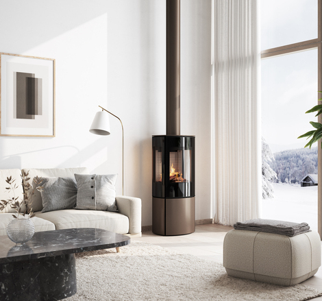 Gas stove CARO 110 in mocha with glass door and side window in a cosy living room