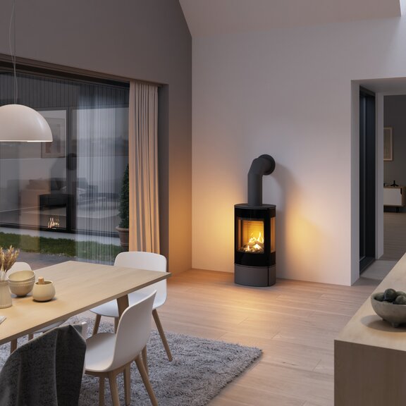 Gas stove CARO 90 in platinum with glass door and side windows in the dining room with cooking island