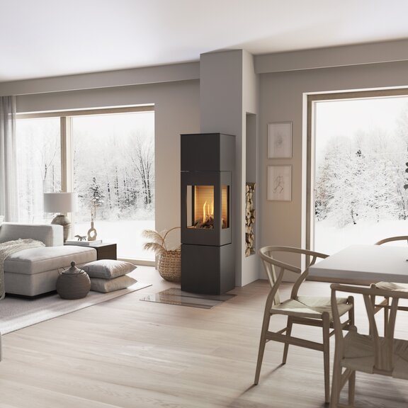 Gas stove NEXO 160 in black with steel door and side windows in the centre of the living room between the dining room and living room