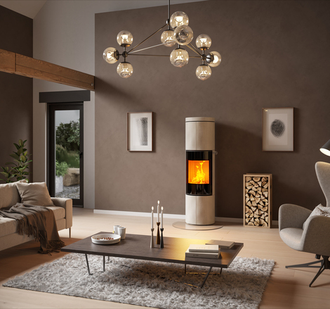 Wood stove JUNO 166 L with natural stone Porto cladding and glass door in a large living room in earthy colours