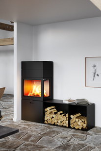 MAX 600/150 in black with one side window Wood stove MAX 600/150 in black with one side window and two side benches as a corner model in the dining room