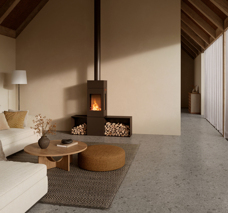 NEXO 140 wood-burning stove in the colour mocha in a simple and bright living room