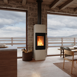 NEXO 160 Porto wood stove in black in the living room with a stone wall