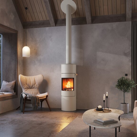 Wood stove VIVA 140 L in the colour sand with steel door in a modern flat in earth tones