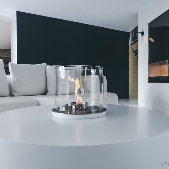 Nice Built-in Rund built into the white living room table in the bright living room