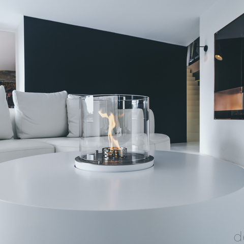 Nice Built-in Rund built into the white living room table in the bright living room
