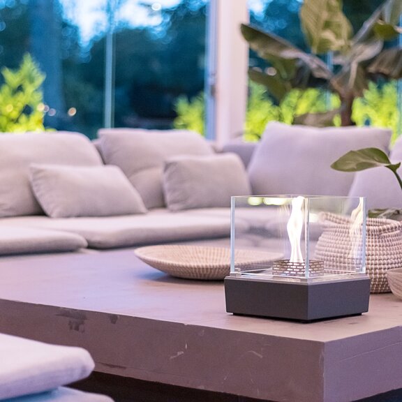 Bioethanol burner Nice on a beige lounge table